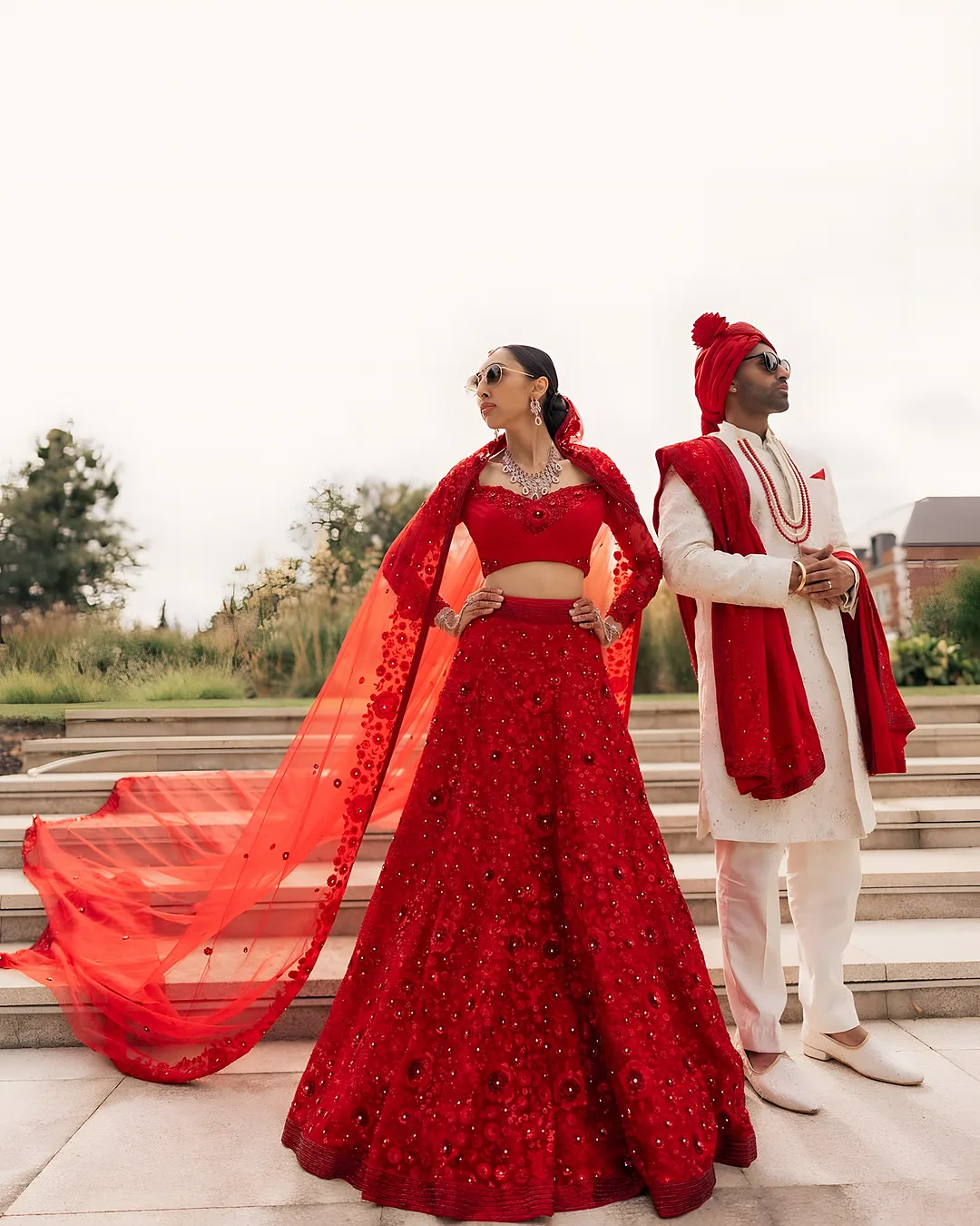 Couple in red on estate steps