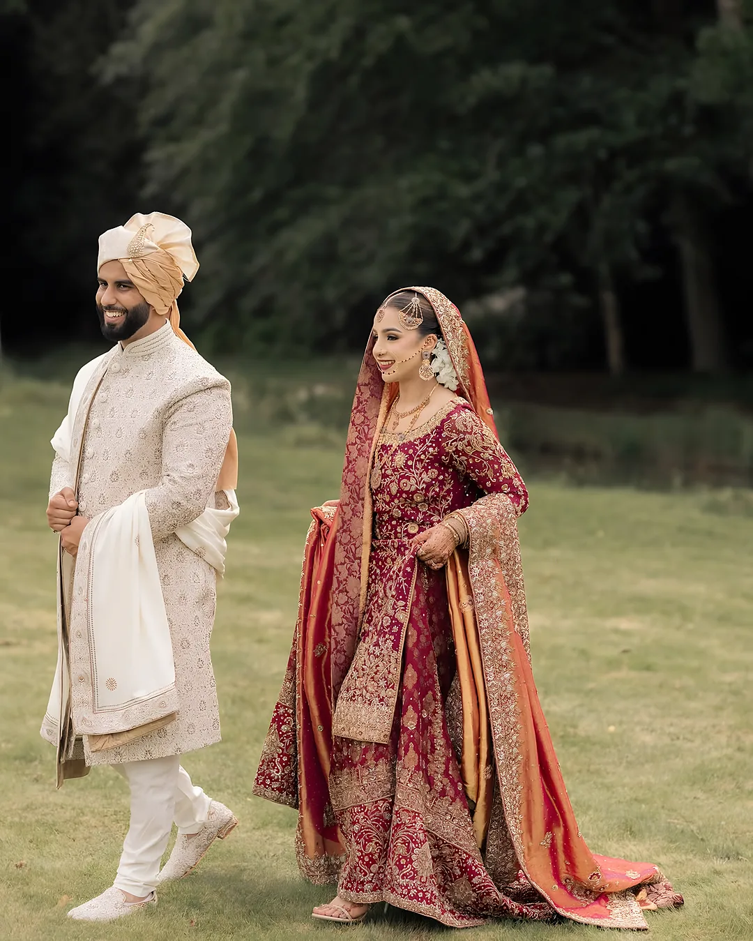 Couple on the lawn of a country house