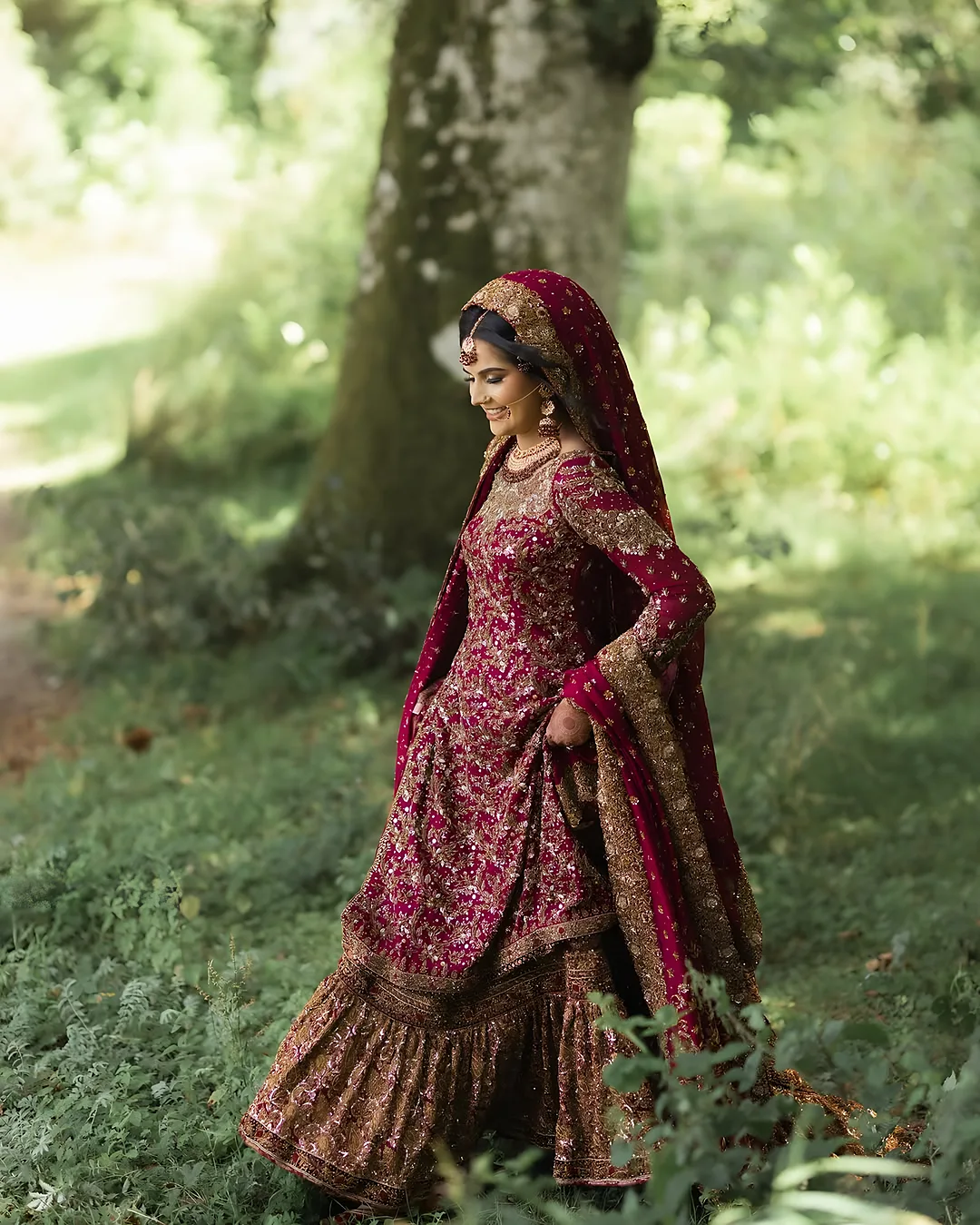 Bride beneath an old tree