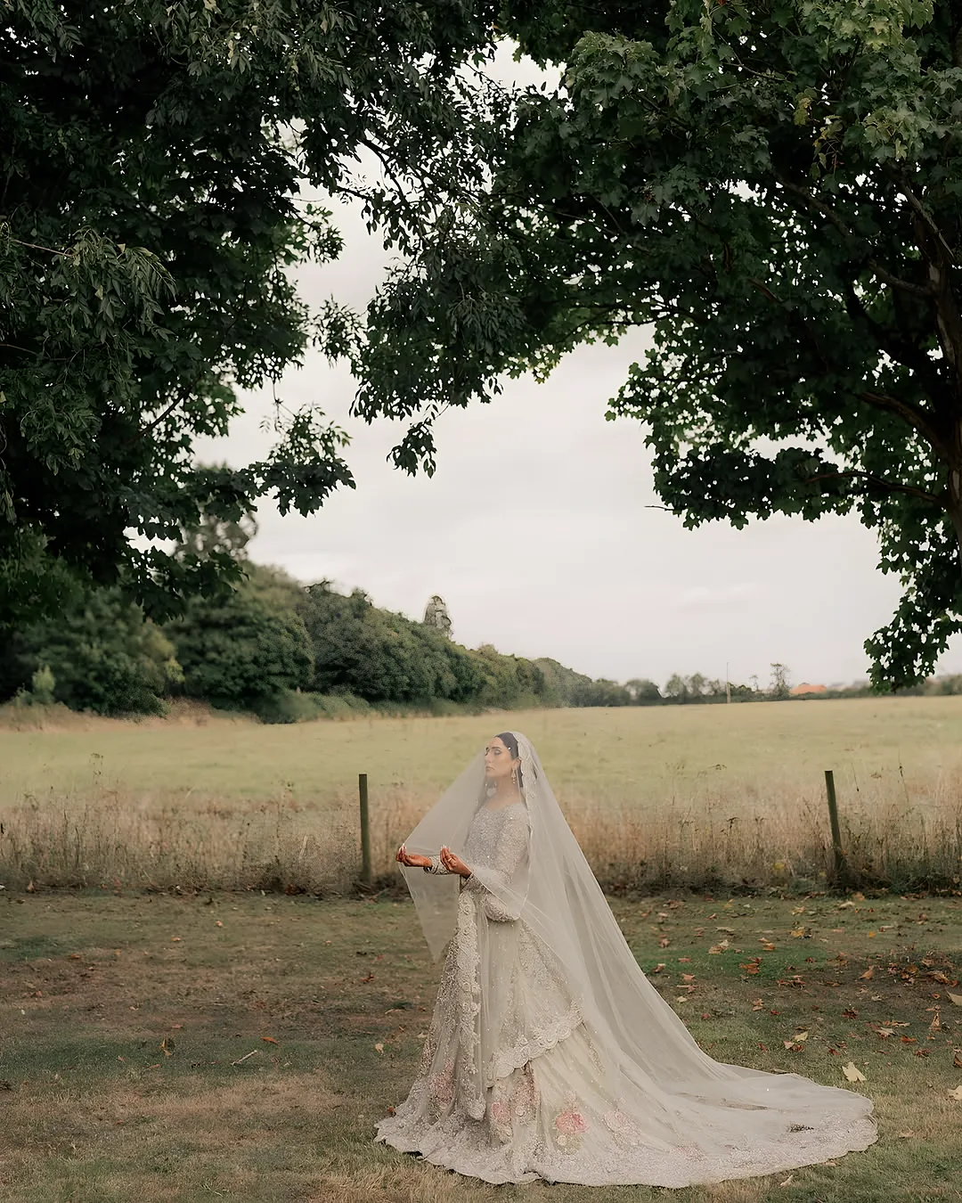 Bride alone in an open field